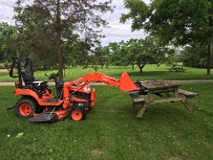 Pallet forks help to move tables.  Pallet forks help to move tables.